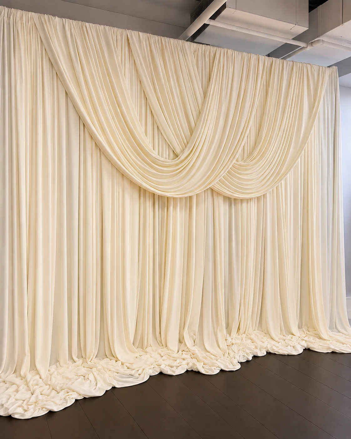 The ivory draped backdrop